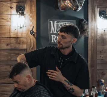 Austin Trephan, barber at Outlaw Barber Company Goose Creek